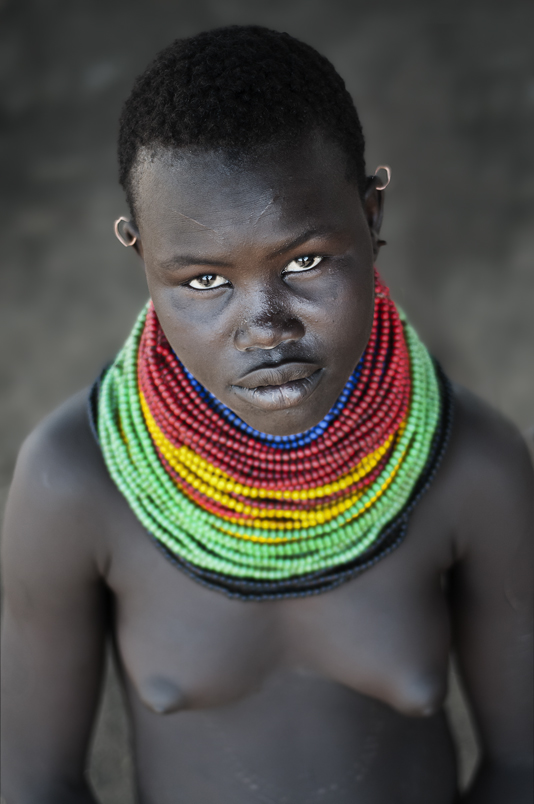Esinien, a young woman from the Nyangatom tribe.
